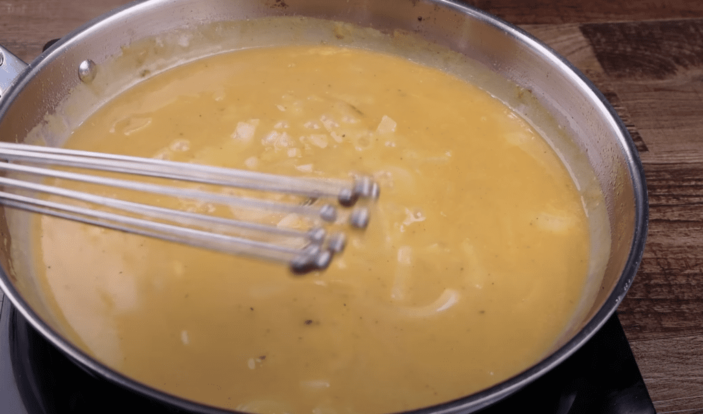 making the gravy for smothered chicken