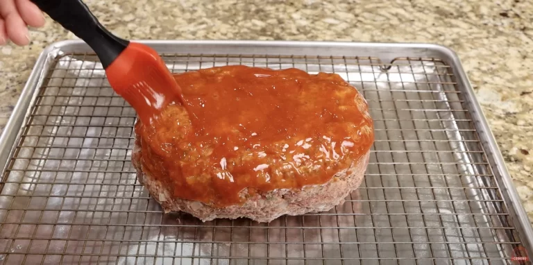 Brushing the Sauce on the Meatloaf