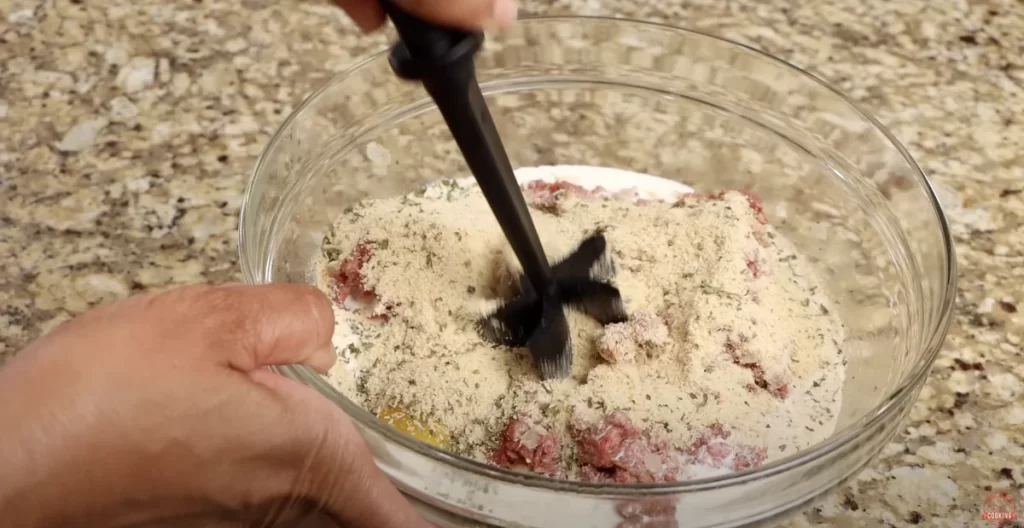 Mixing all Ingredients for Meatloaf
