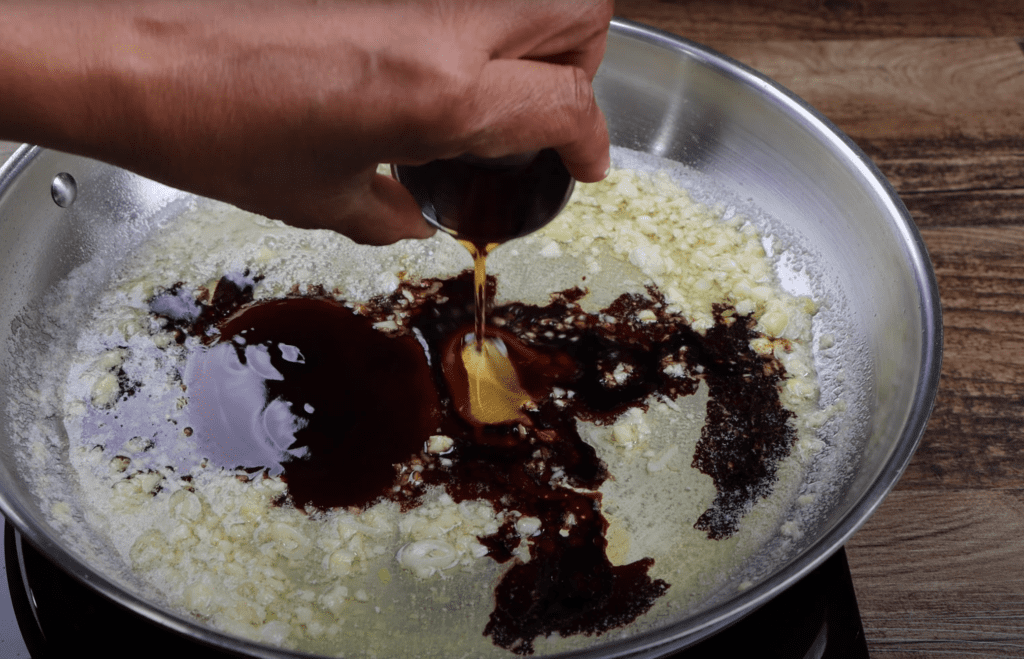 garlic, butter and scallions, soy sauce, oyster sauce and sesame oil