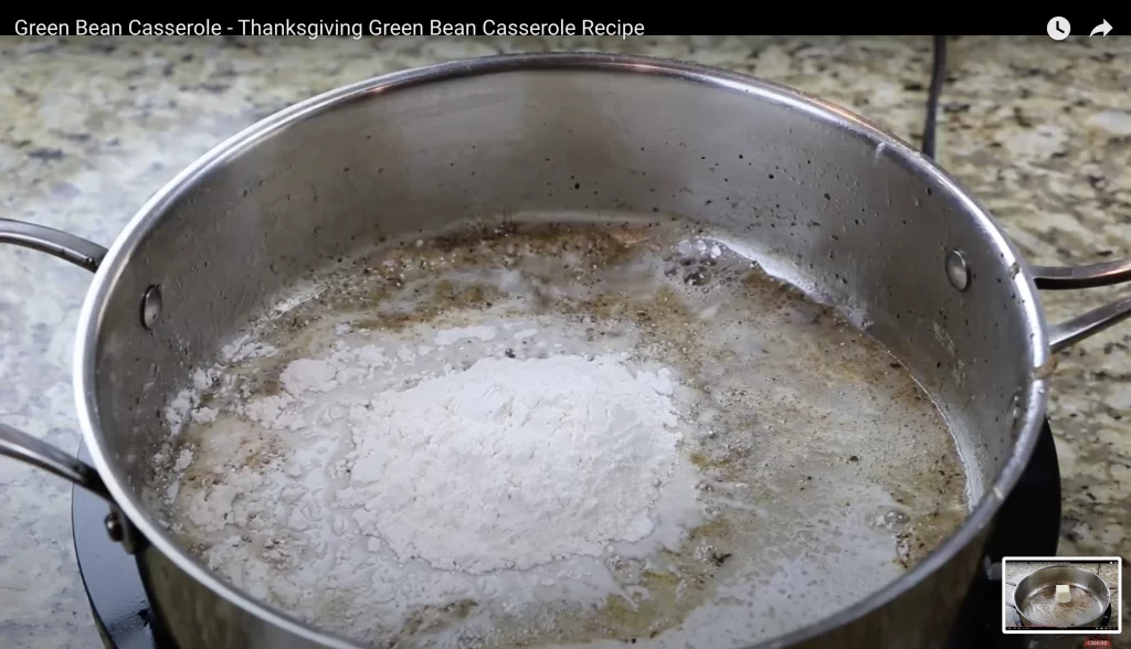 adding flour to create a roux