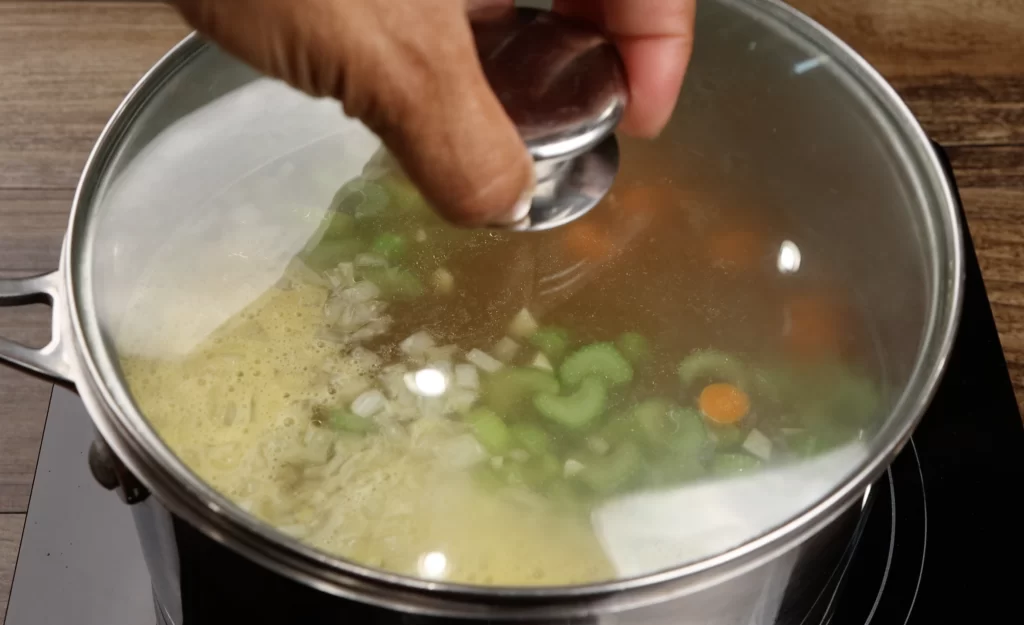 simmering the turkey stock for the turkey gravy