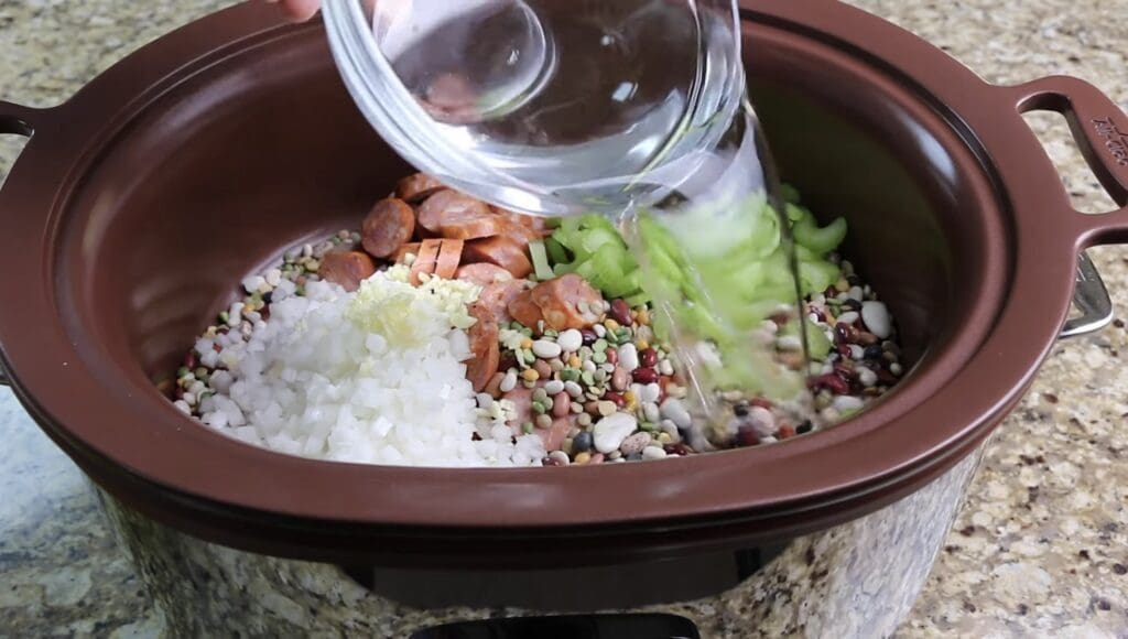 adding the water to 15 bean soup