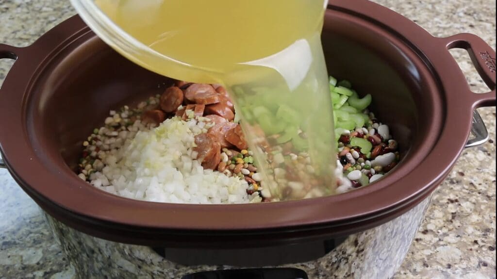 adding the chicken stock to 15 bean soup
