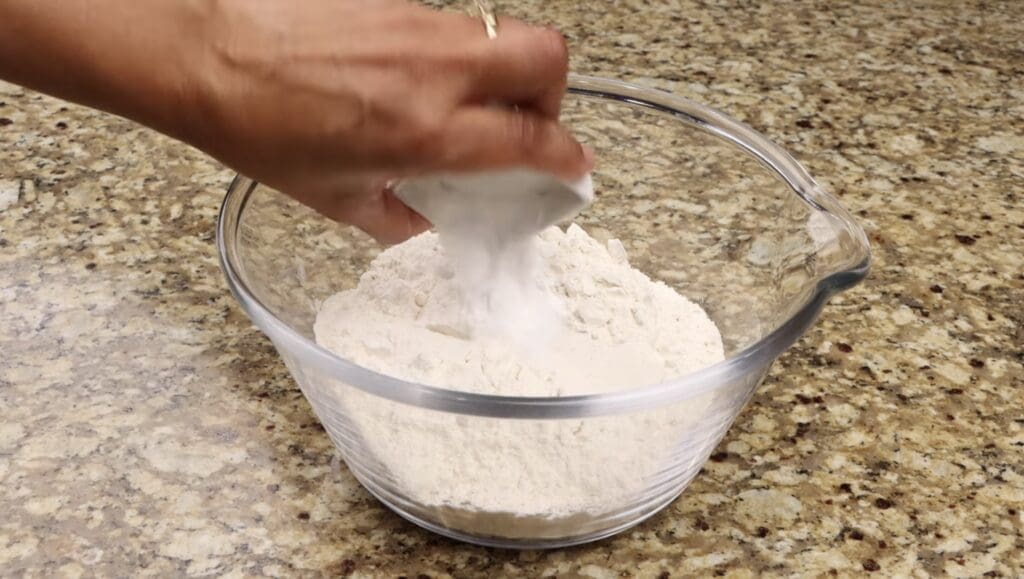 mixing the dry ingredients for the chocolate chip walnut cookies