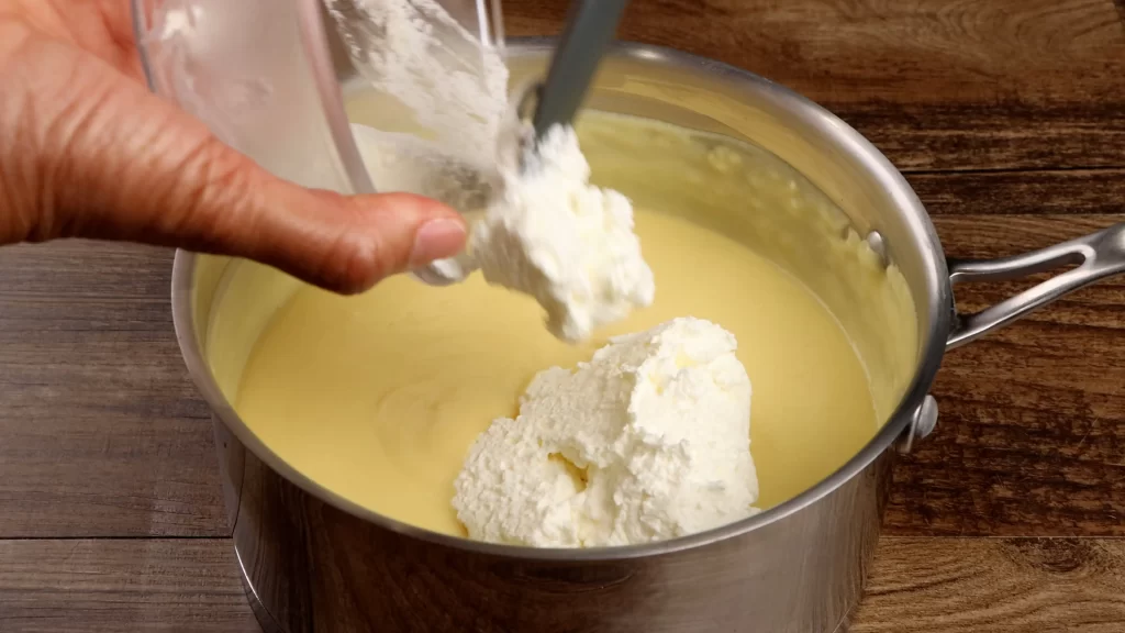 adding the whipped cream to the pudding mixture